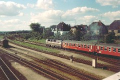 DSB MZ class with passenger train photographed in Fredericia heading for København. 4. September 1977. The MZ class (type I and II) was purchased from 1967 to 1970 in a number of 26. Only a few of these engines remain in service by DSB - most are now sold to other companies. Built by NOHAB and Frichs. Dieselelectric. Co'Co'. 2270 kW - 3300 hp. Max speed 143 km/h - 89 mph. Length 20 800 mm. Weight 116,5 metric tonnes.
